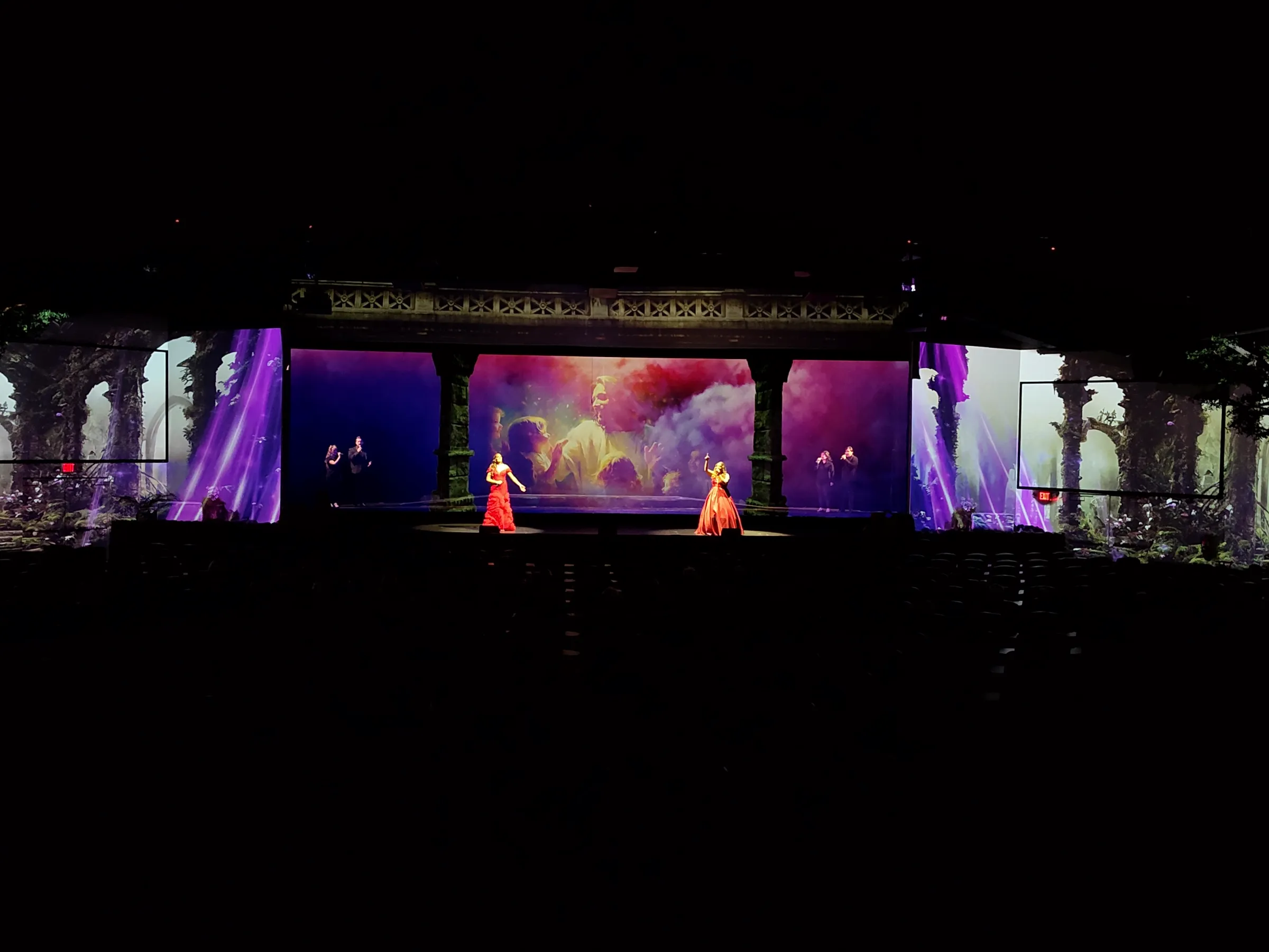 a flat screen television in a dark room